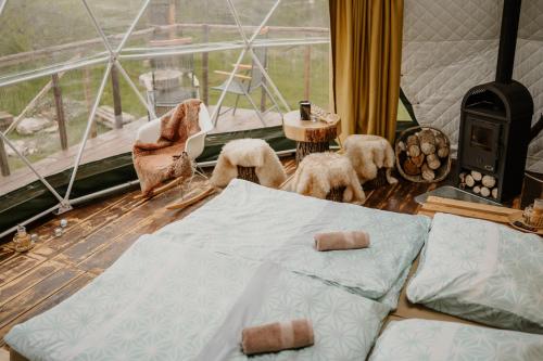 Кровать или кровати в номере GLAMPING SLOVENSKO