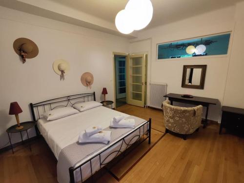 Llit o llits en una habitació de Syntagma apartment C3