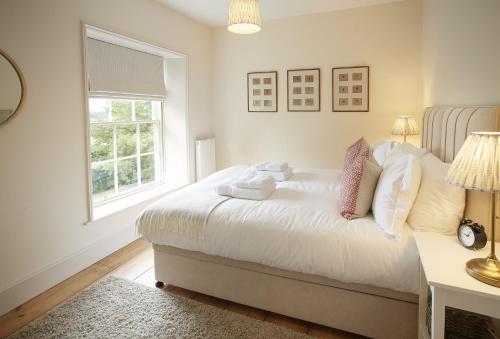 Letto o letti in una camera di Walesby House