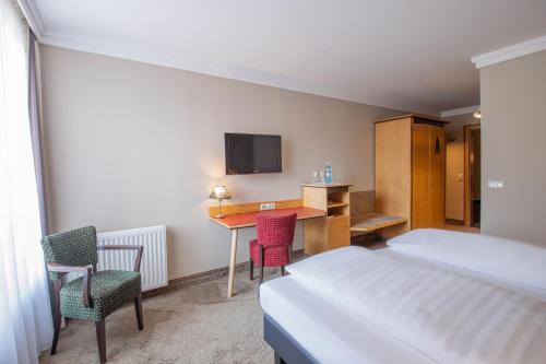 Katil atau katil-katil dalam bilik di Hotel Tanne Ilmenau