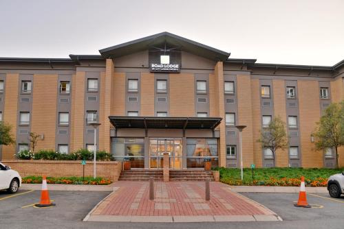 a hotel with a sign on the front of it at Road Lodge Southgate in Southgate