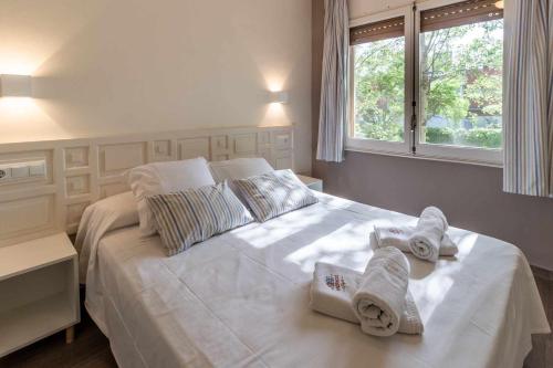 Ένα ή περισσότερα κρεβάτια σε δωμάτιο στο Polcent 8 Apartamento cercano a la playa