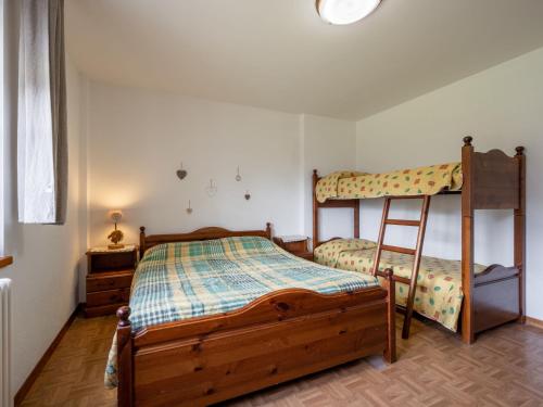 Postel nebo postele na pokoji v ubytování Apartment Aigle by Interhome