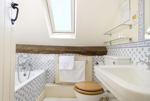 Ένα μπάνιο στο Coach House Hawling