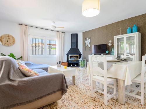 a living room with a couch and a table at Villa Villa Lolin by Interhome in Vinaròs