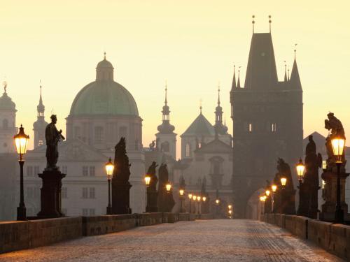 a foggy street with buildings in the background at Holiday Home Florida by Interhome in Prague