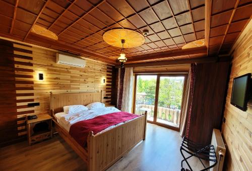Katil atau katil-katil dalam bilik di Saruhan Hotel