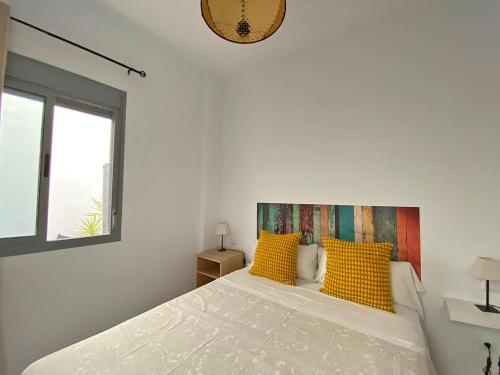 Posteľ alebo postele v izbe v ubytovaní TRIANA EXCLUSIVE con terraza privada