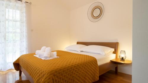 Ένα ή περισσότερα κρεβάτια σε δωμάτιο στο Mozart apartments