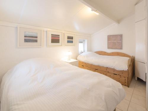 Llit o llits en una habitació de Holiday Home Village Park by Interhome