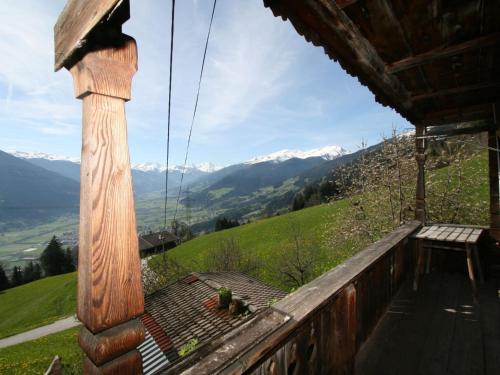 a balcony of a house with a view of mountains at Apartment Tom by Interhome in Schlitters
