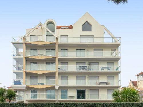 an apartment building with a house on top at Apartment Claire-4 by Interhome in Arcachon