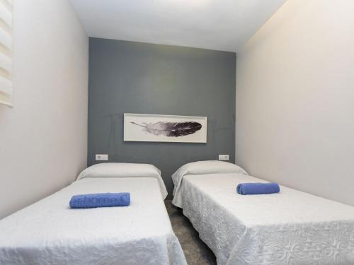 Postel nebo postele na pokoji v ubytování Apartment Abanicos by Interhome