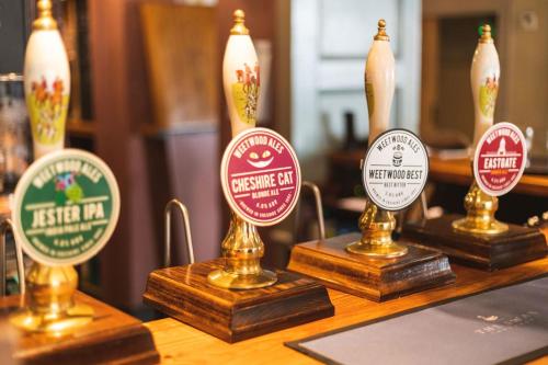 a group of beer awards on a table at The Swan at Tarporley in Tarporley