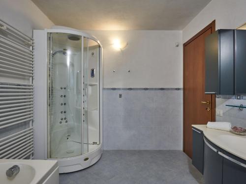 a bathroom with a shower and a sink at Holiday Home Casa Grandola-Green Garden by Interhome in Naggio