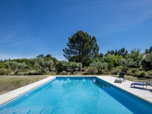 an image of a swimming pool with trees in the background at Holiday Home Vista Panorâmica- Herdade de Montalvo by Interhome in Alcácer do Sal