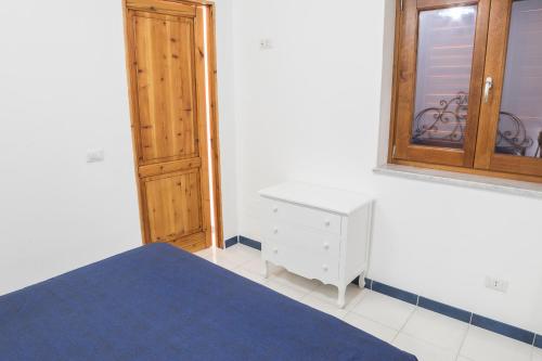 Letto o letti in una camera di La Bomboniera