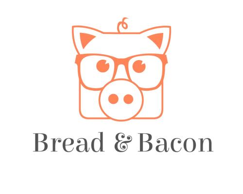 a head of a pig with glasses and the words bread and bacon at adoba® Dreamland in Gulliver