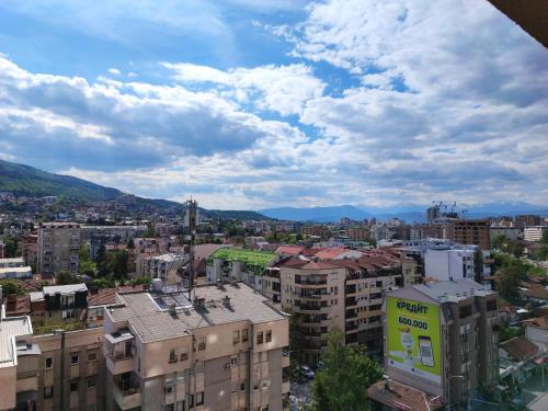 uitzicht op een stad met gebouwen bij Grand View Apartment in Skopje