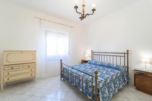 Postel nebo postele na pokoji v ubytování Casa Teresa