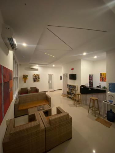 TV a/nebo společenská místnost v ubytování The Packerbox Hostel