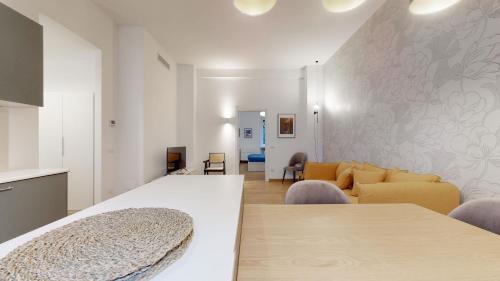 A seating area at SAHI - Dei dell'Olimpo apartments Porta Romana