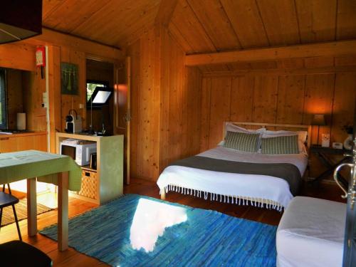 Postel nebo postele na pokoji v ubytování Ecorturismo Casa Espigueiro P Nacional Peneda Geres