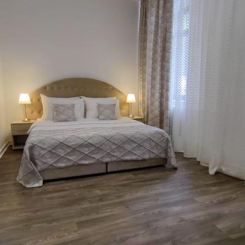 Postel nebo postele na pokoji v ubytování Hotel N