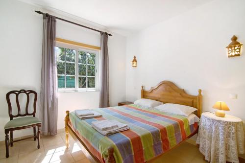 Ένα ή περισσότερα κρεβάτια σε δωμάτιο στο Algarve apartments E