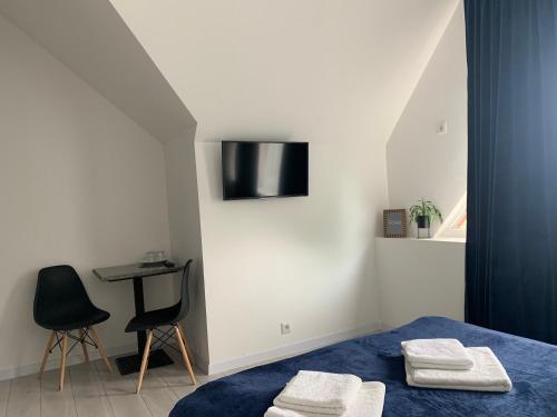 Postel nebo postele na pokoji v ubytování Hotel Femina