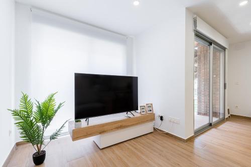 TV a/nebo společenská místnost v ubytování Apartamento Sunrise Chapaprieta
