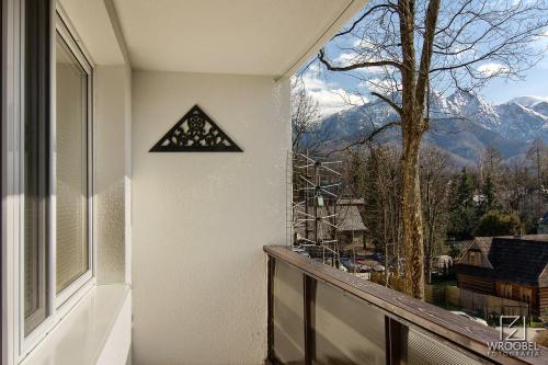 a balcony with a view of a mountain at Apartament Zakopane centrum Dariusz Czekański in Zakopane