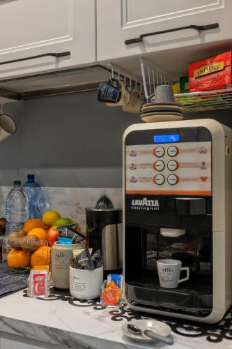 a microwave sitting on a counter in a kitchen at Ancona e Riviera Luxury b&b in Ancona