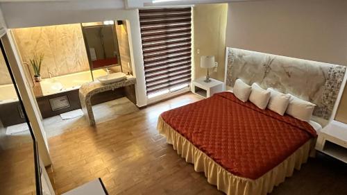 Cama o camas de una habitación en Hotel del Valle Inn