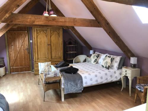 Postel nebo postele na pokoji v ubytování La forge b&b