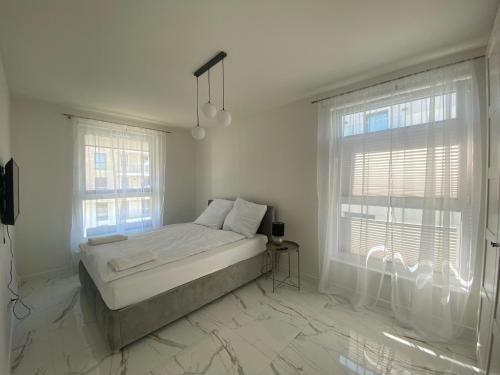 Llit o llits en una habitació de Imperial Suite - Luxury Living