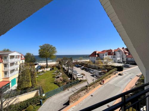 a view from a balcony of a street and buildings at Ferienwohnungen Ostseeblick in Bansin