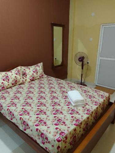 Cama o camas de una habitación en Serene Inn Kandana