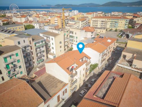 an aerial view of a city with buildings at AffittaSardegna - Casa Merisi in Alghero