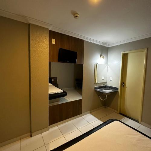 Postel nebo postele na pokoji v ubytování Hotel Clima