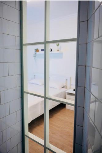 Katil atau katil-katil dalam bilik di Pop luxury apartments