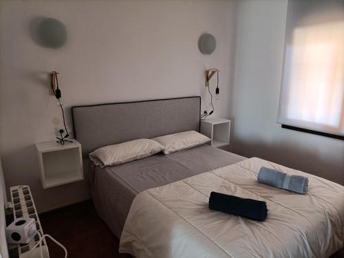 Ένα ή περισσότερα κρεβάτια σε δωμάτιο στο Riells mar