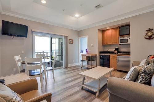 a living room with a couch and a table at The Cliffside Resort Condominiums in Greenport