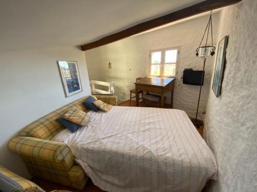 Katil atau katil-katil dalam bilik di L'Oustau de Cotignac