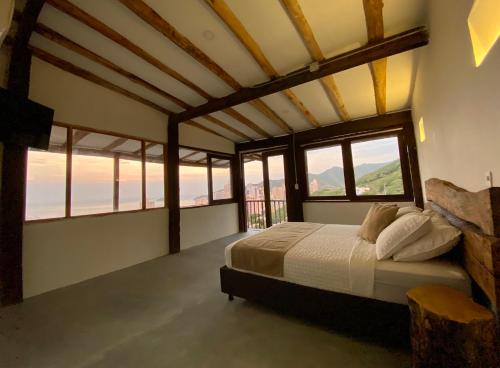 Uma cama ou camas num quarto em Akela Gaira Hotel