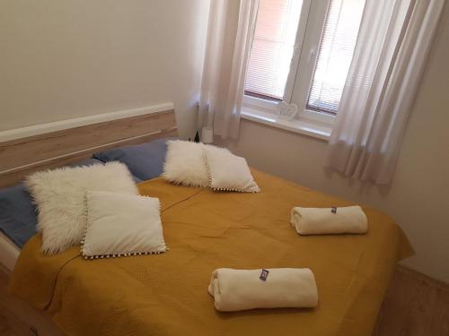 Postel nebo postele na pokoji v ubytování Apartmán Horec A32