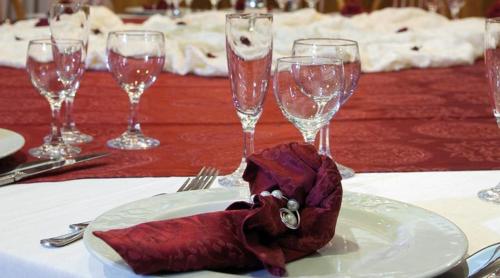 a table with a plate with a red heart on it at Albergo Ristorante Uliveto in Veroli