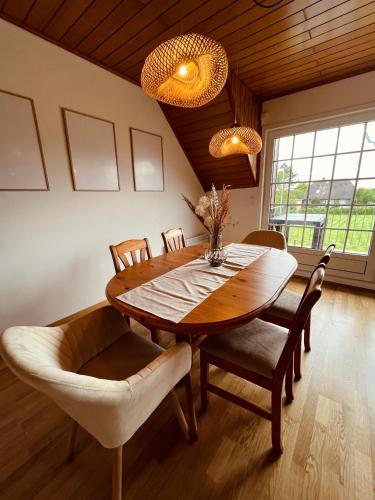 Ruang duduk di Frieda - Ferienwohnung mit Deichblick