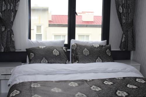 Ein Bett oder Betten in einem Zimmer der Unterkunft Kaya Home Apart Otel