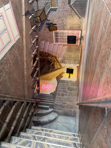 an overhead view of a staircase in a building at Pariwana Hostel Cusco in Cusco